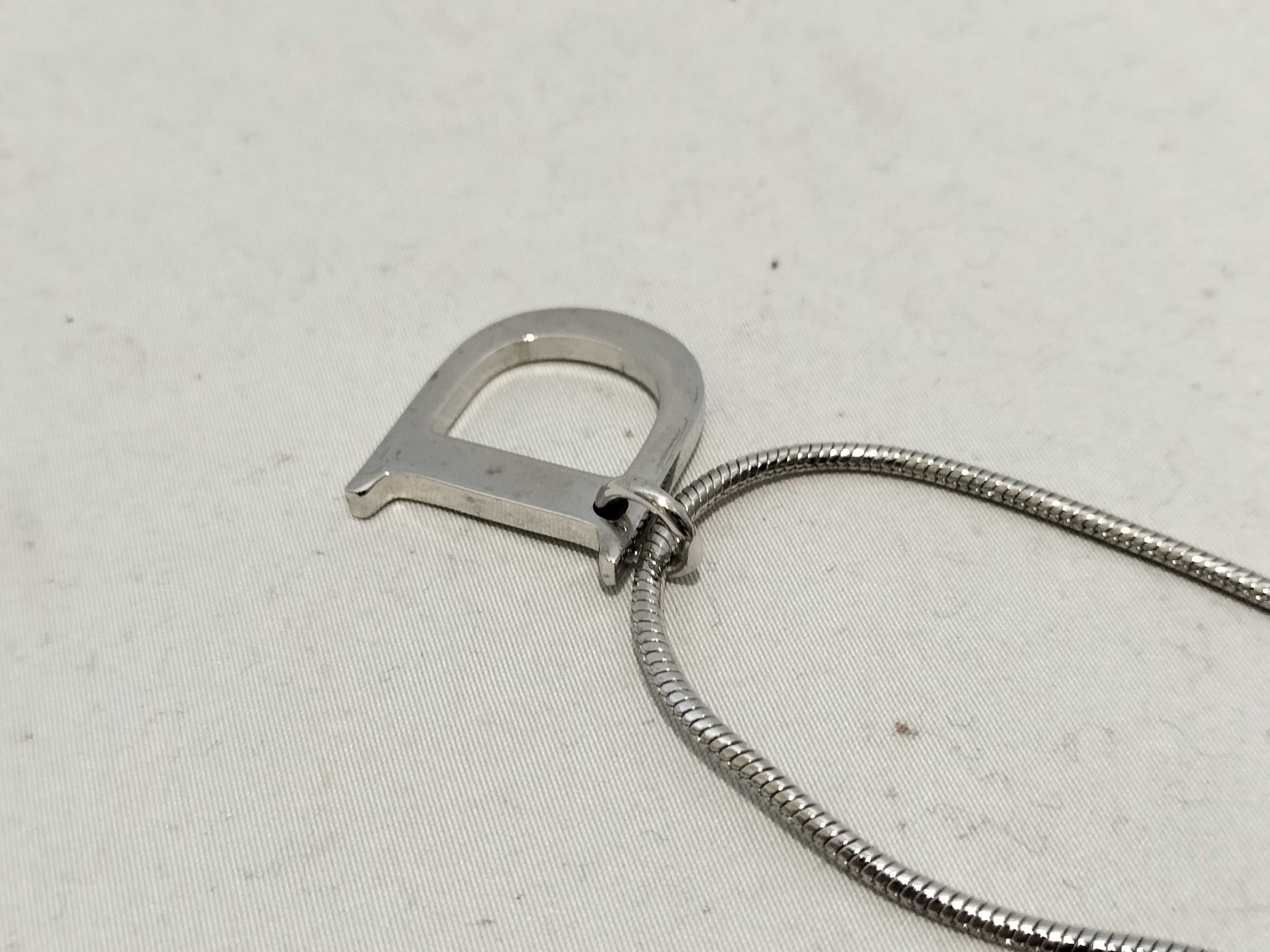Dior D logo necklace