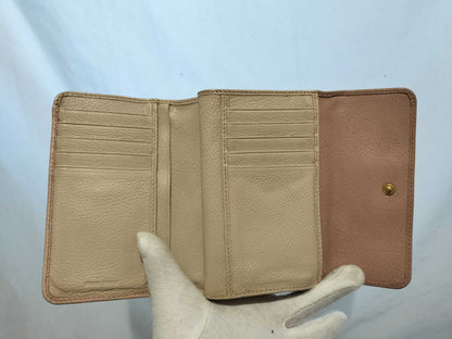 5-piece women's wallet featuring CHANEL, Coco Mark, Miu Miu, and other items.