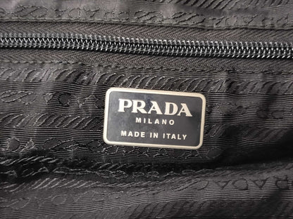 PRADA nylon triangular logo bag, zipper damage, condition considered. Tote bag