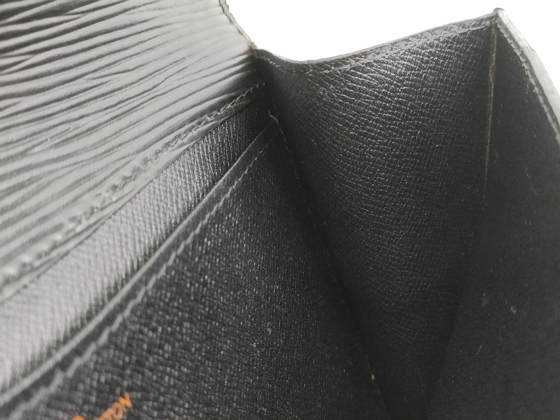 LOUIS VUITTON RFID verification failed. Epi Art Deco clutch bag M52632. Sticky interior.