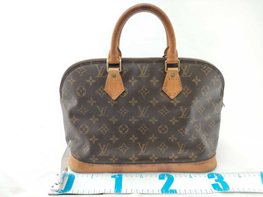 LOUIS VUITTON Monogram Alma Handbag