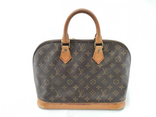 LOUIS VUITTON Monogram Alma Handbag