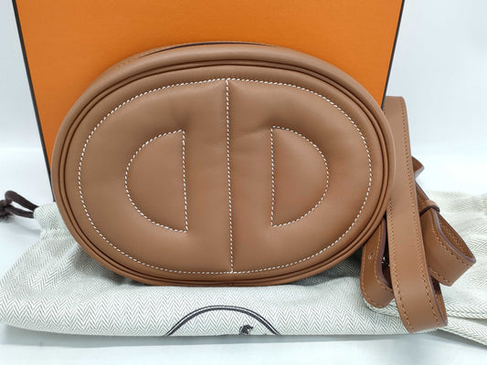 HERMES In the Loop Body Bag, Swift Leather, Gold
