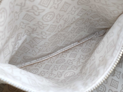 LOUIS VUITTON Taisienne PM Handbag with Stain
