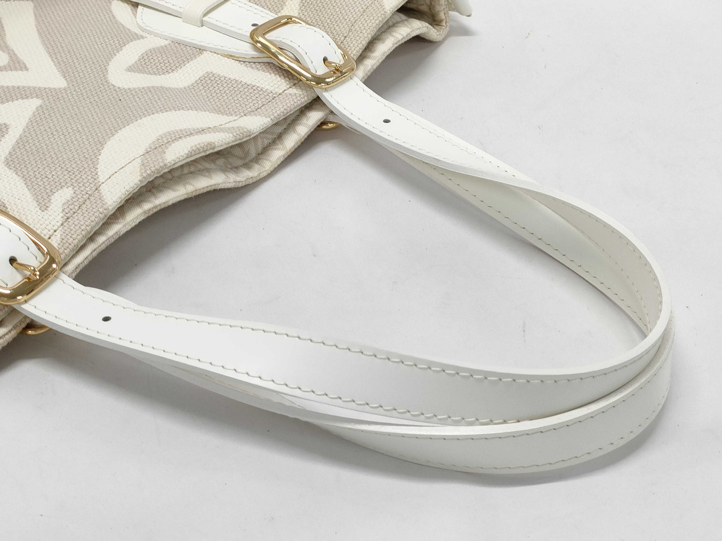 LOUIS VUITTON Taisienne PM Handbag with Stain