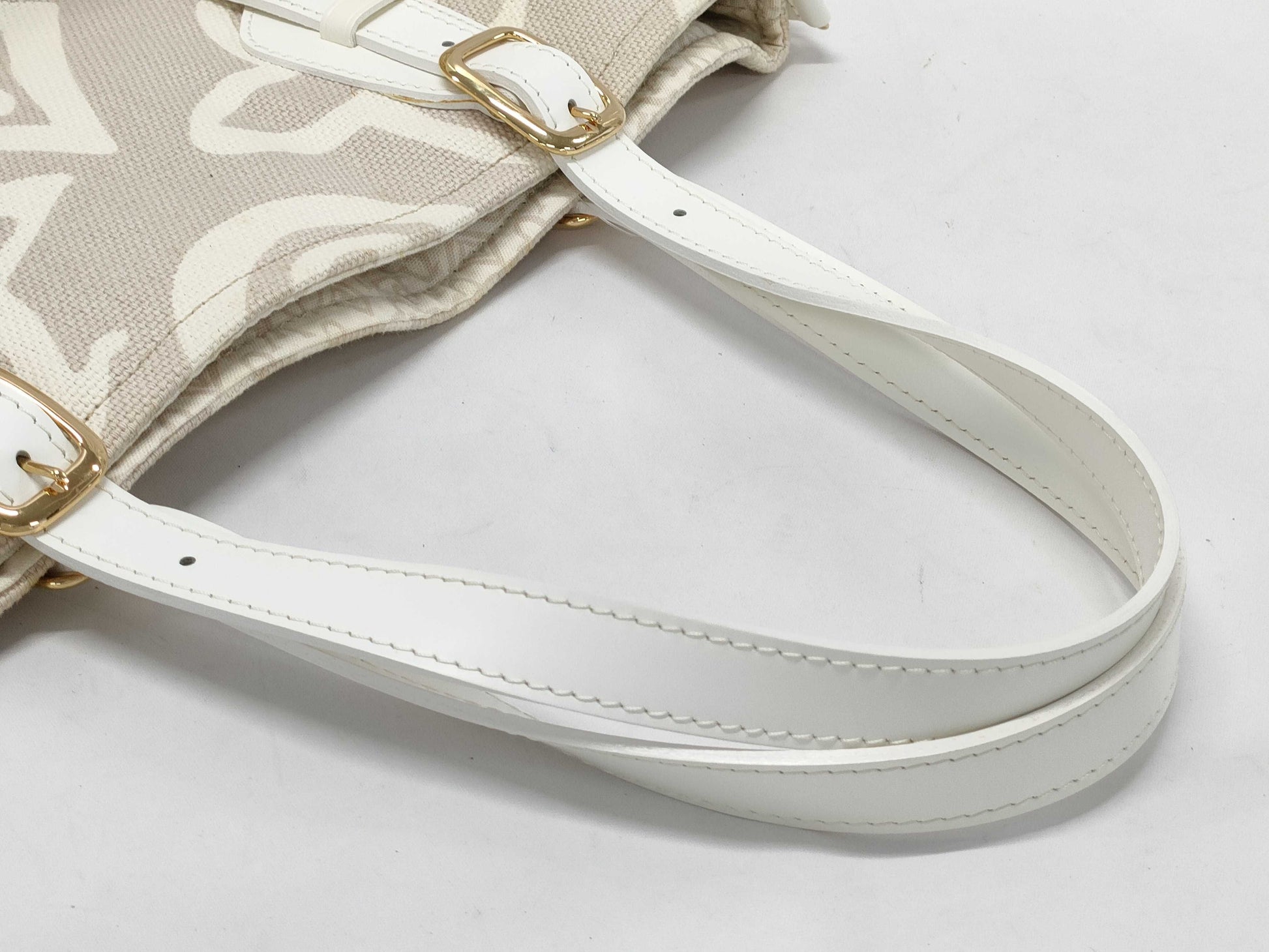 LOUIS VUITTON Taisienne PM Handbag with Stain