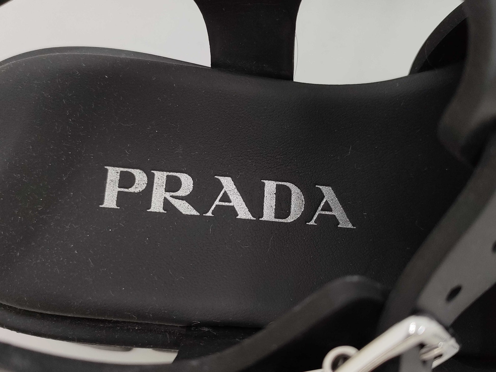 PRADA Triangle Plate Rubber Black Sandals