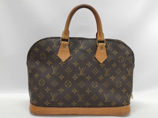 LOUIS VUITTON Monogram Alma Handbag