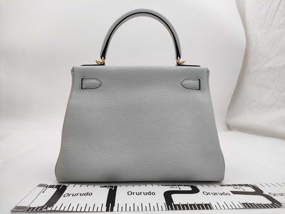HERMES Kelly 28 handbag, inlaid with blue pale blue, Taurillon Clemence leather, gold hardware, Y stamp