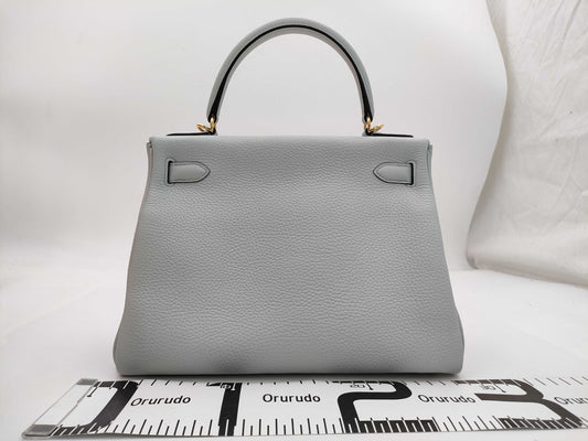 HERMES Kelly 28 handbag, inlaid with blue pale blue, Taurillon Clemence leather, gold hardware, Y stamp