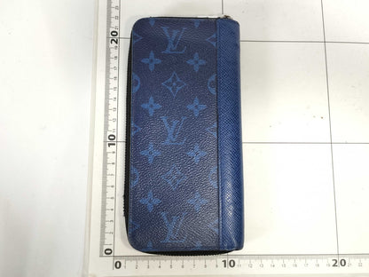 LOUIS VUITTON Taigarama Zippy Vertical Wallet