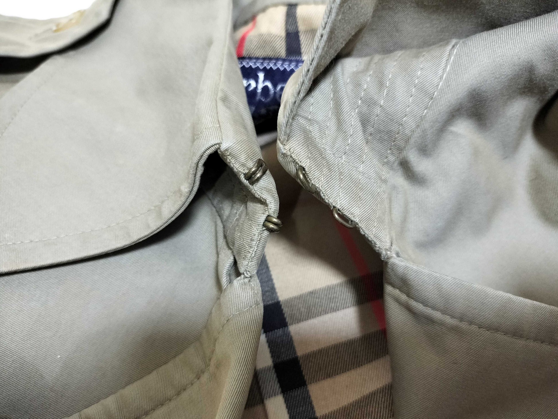BURBERRY trench coat, stains and signs of wear.