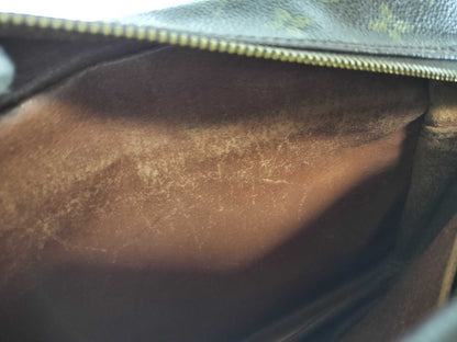 LOUIS VUITTON Monogram Migratour Shoulder Bag
