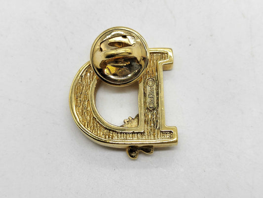 Dior logo brooch