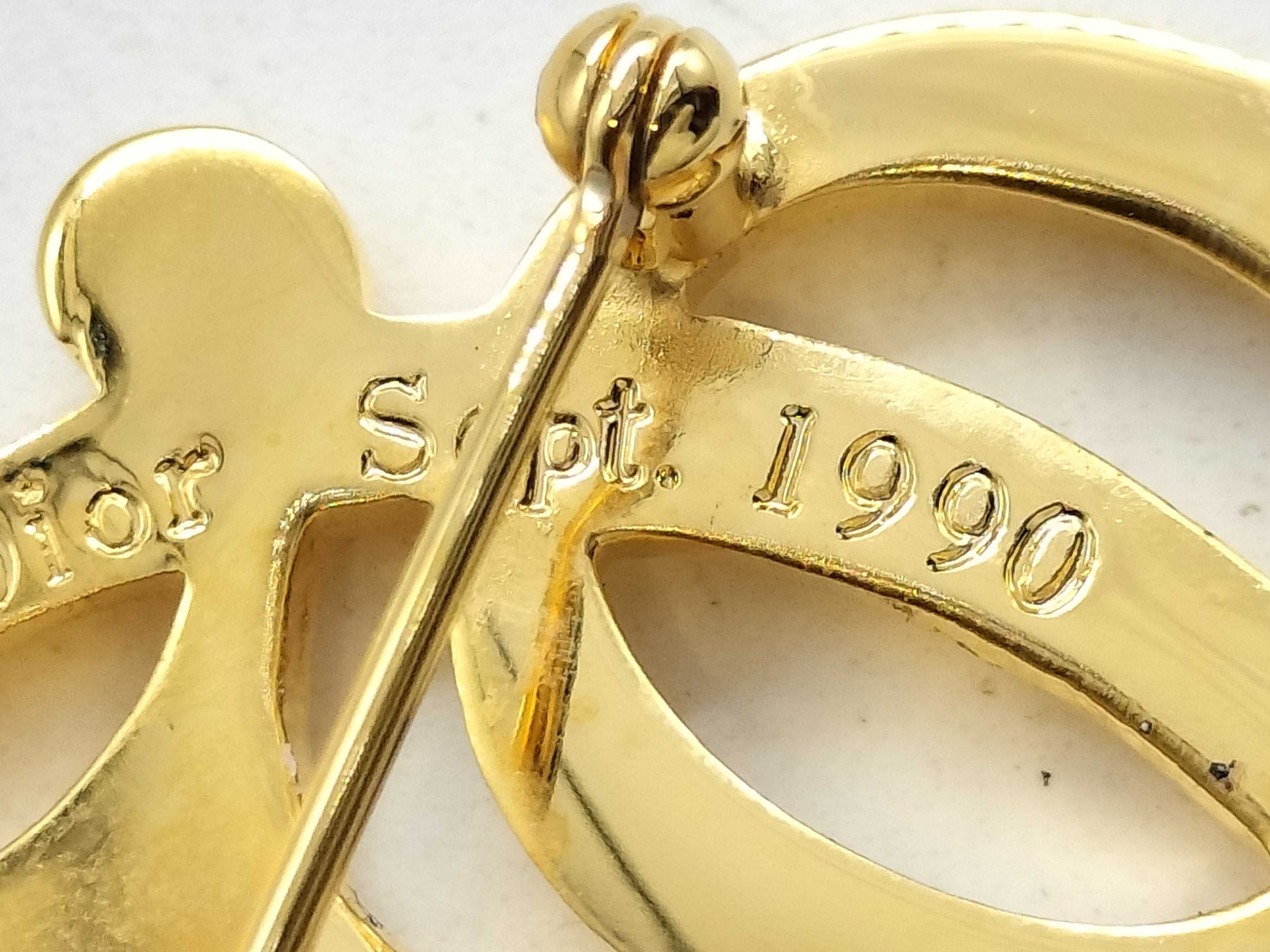 Dior logo brooch brooch