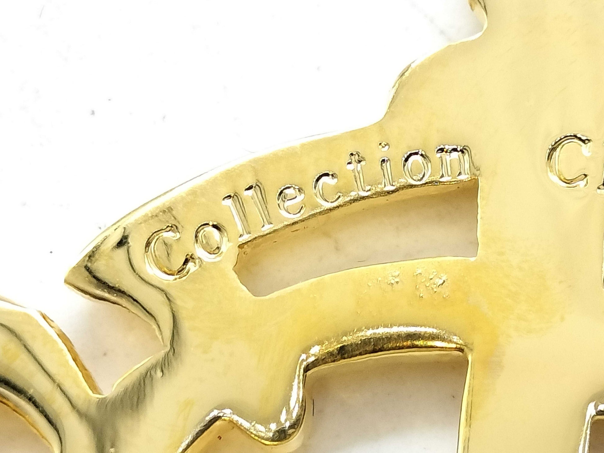 Dior logo brooch brooch