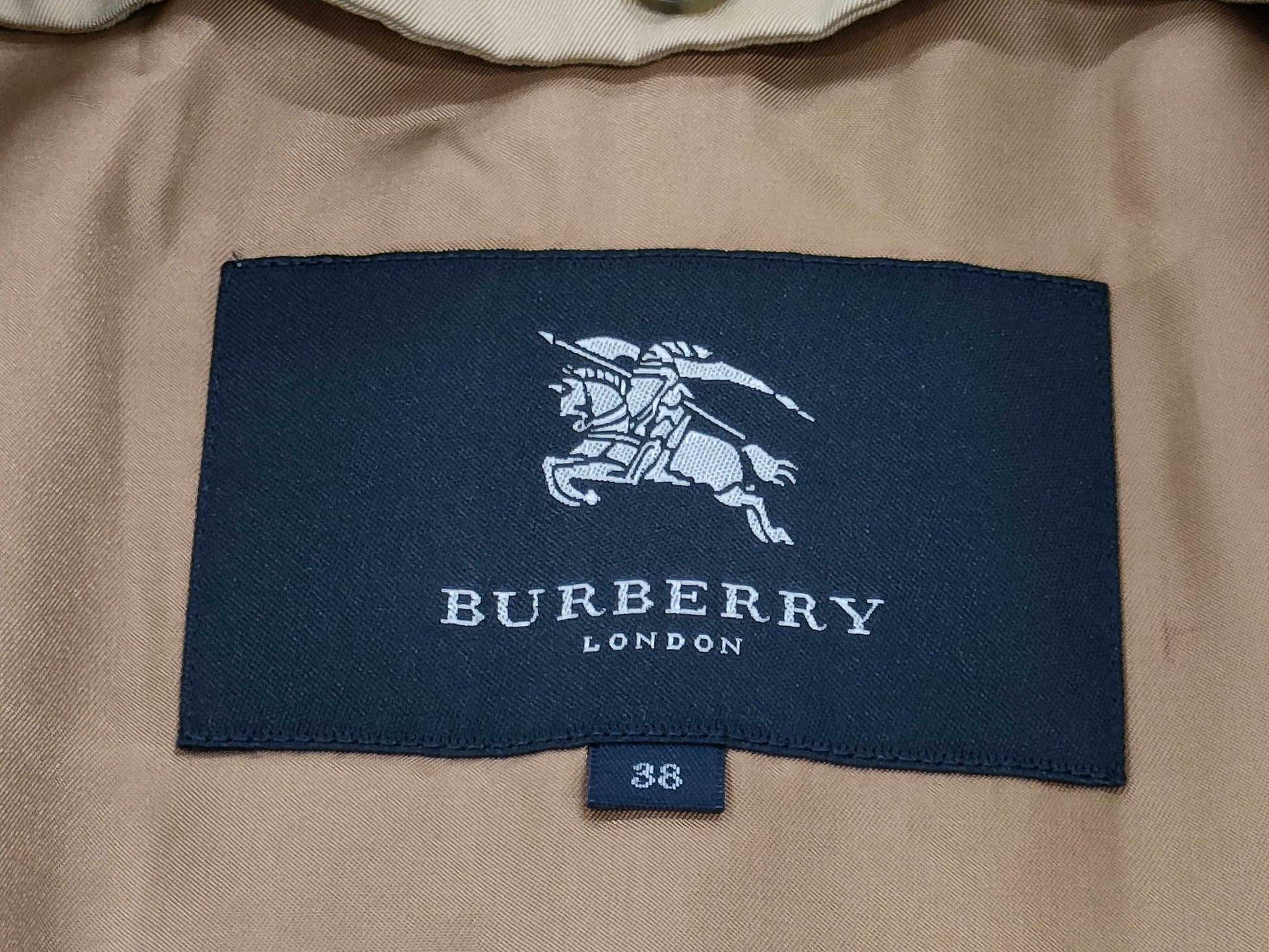 BURBERRY fur coat with tag