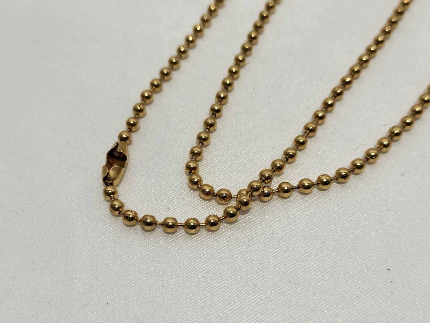Dior necklace charm