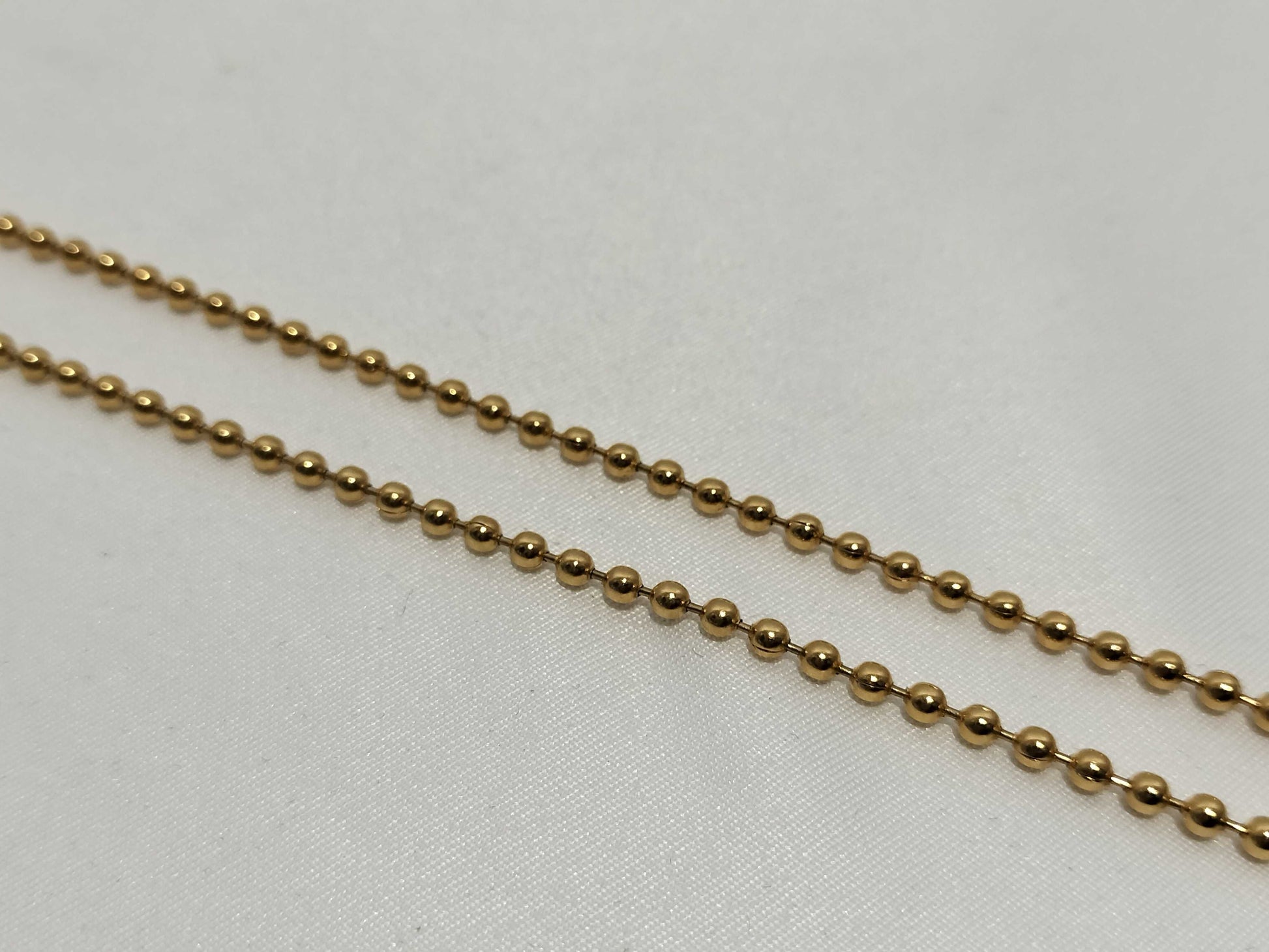Dior necklace charm
