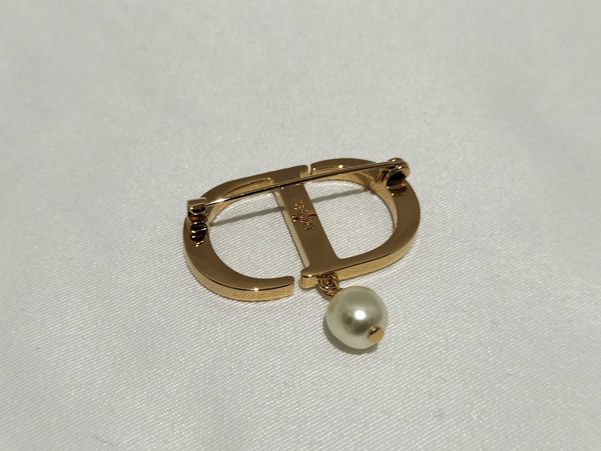 Dior logo rhinestone pearl brooch
