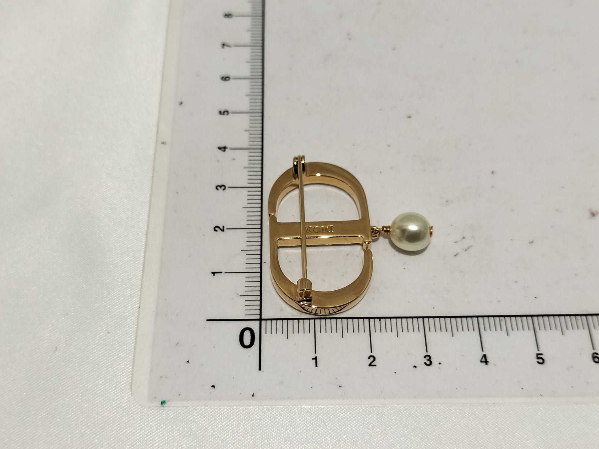 Dior logo rhinestone pearl brooch