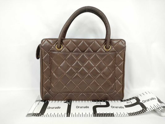 CHANEL Lambskin Quilted Handbag