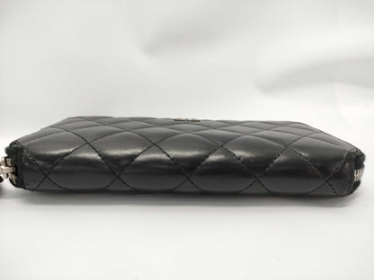 CHANEL Lambskin Round Zip Wallet
