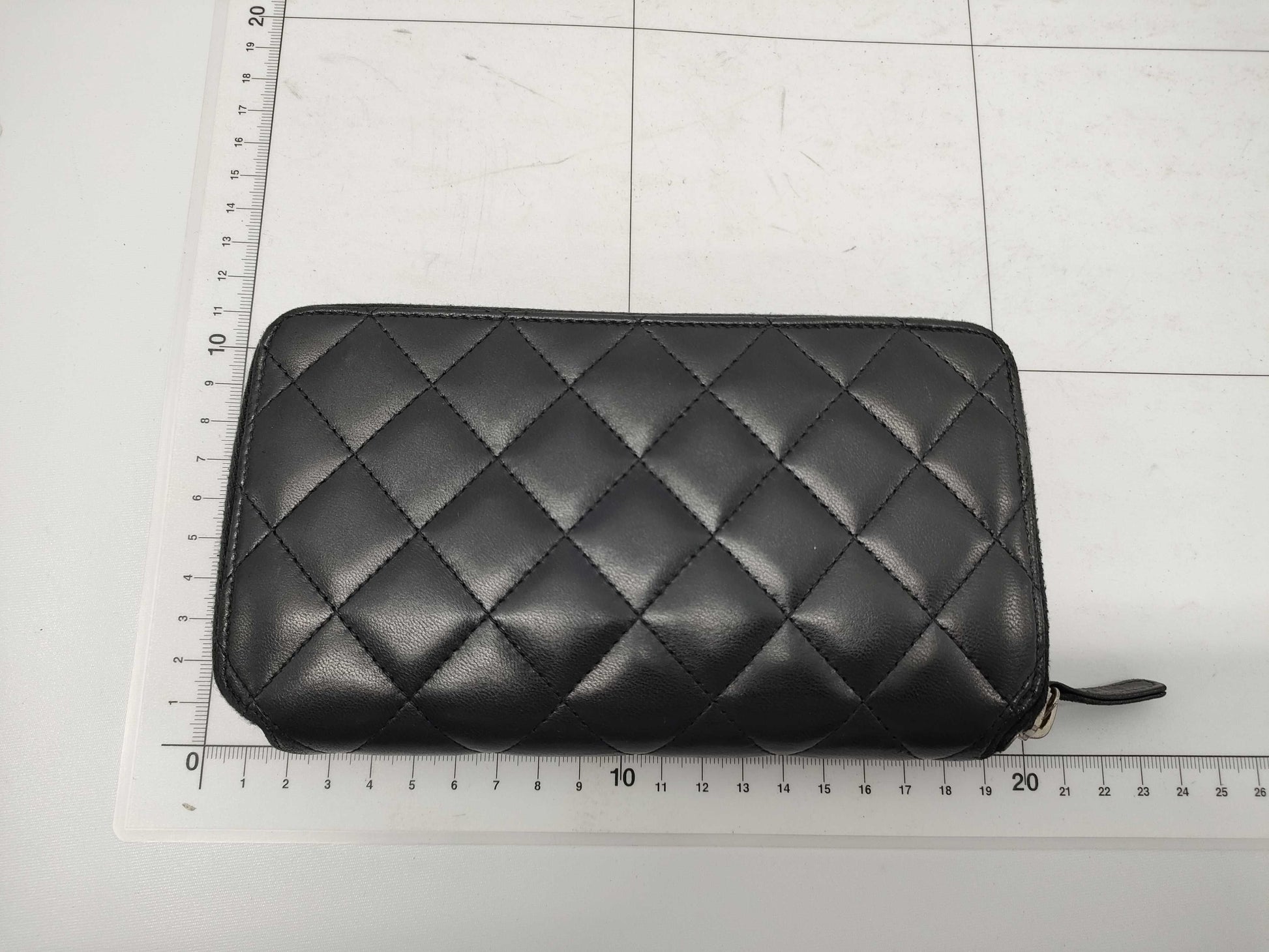 CHANEL Lambskin Round Zip Wallet