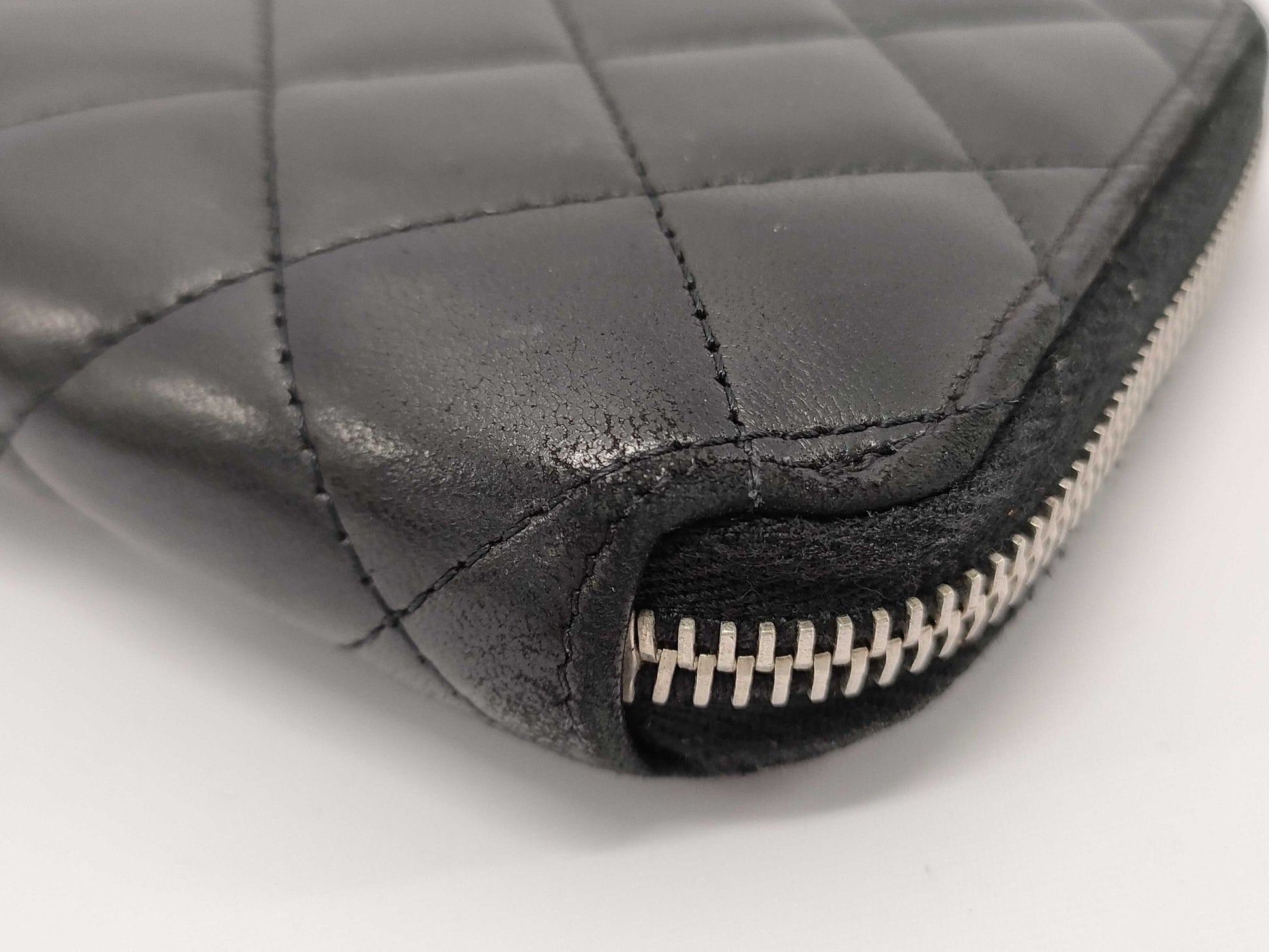 CHANEL Lambskin Round Zip Wallet