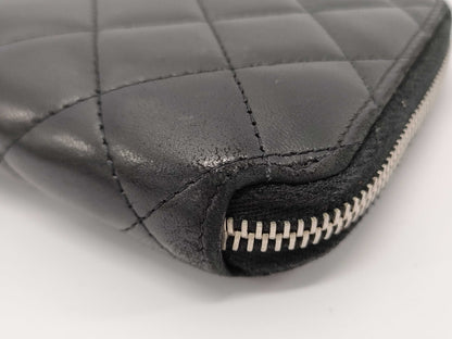 CHANEL Lambskin Round Zip Wallet