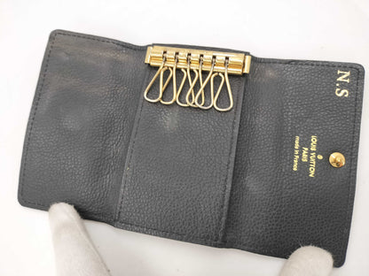 LOUIS VUITTON Empreinte Multicle 6 Initial Wallet