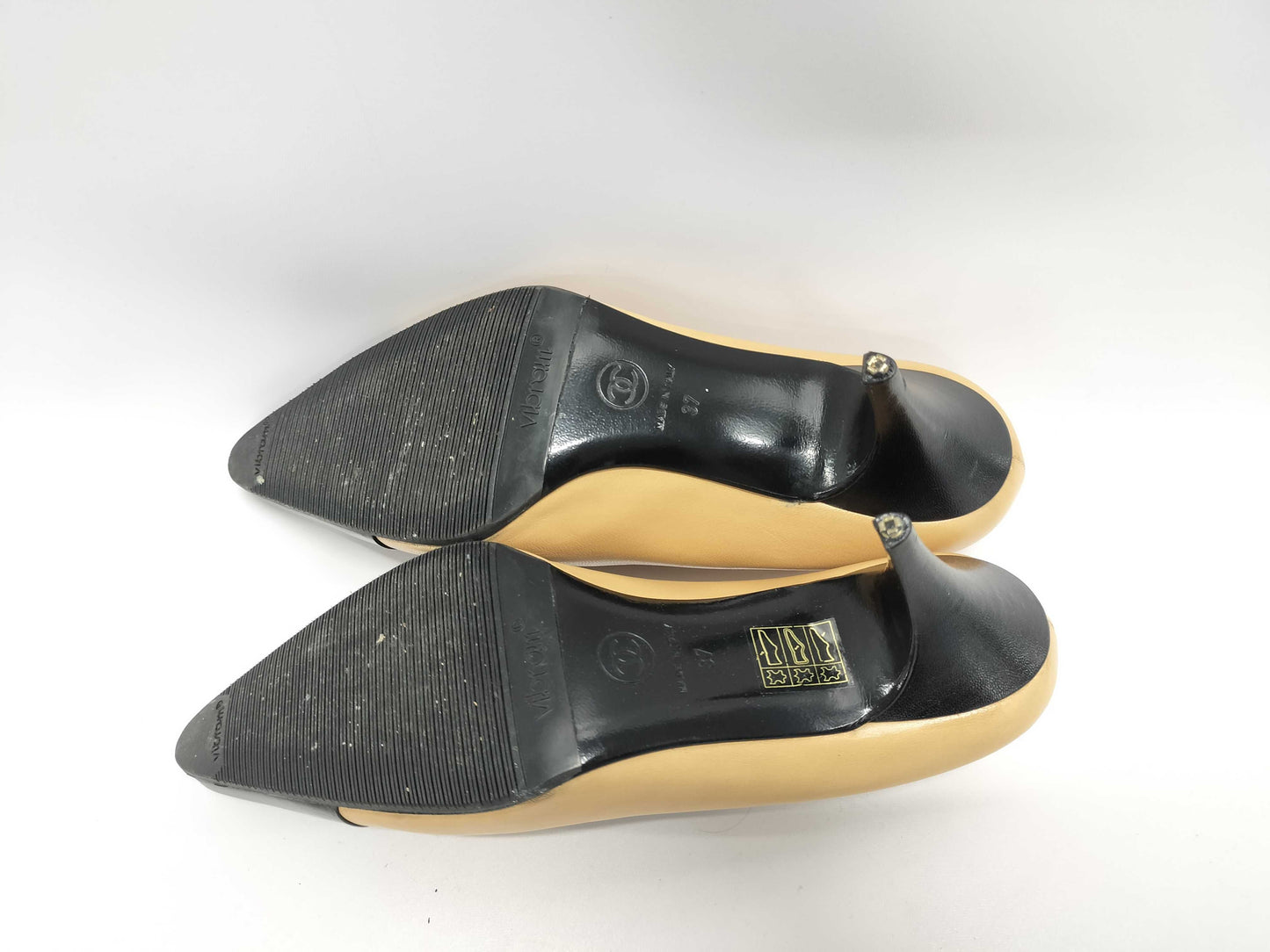 CHANEL Leather/Coco Button Pumps