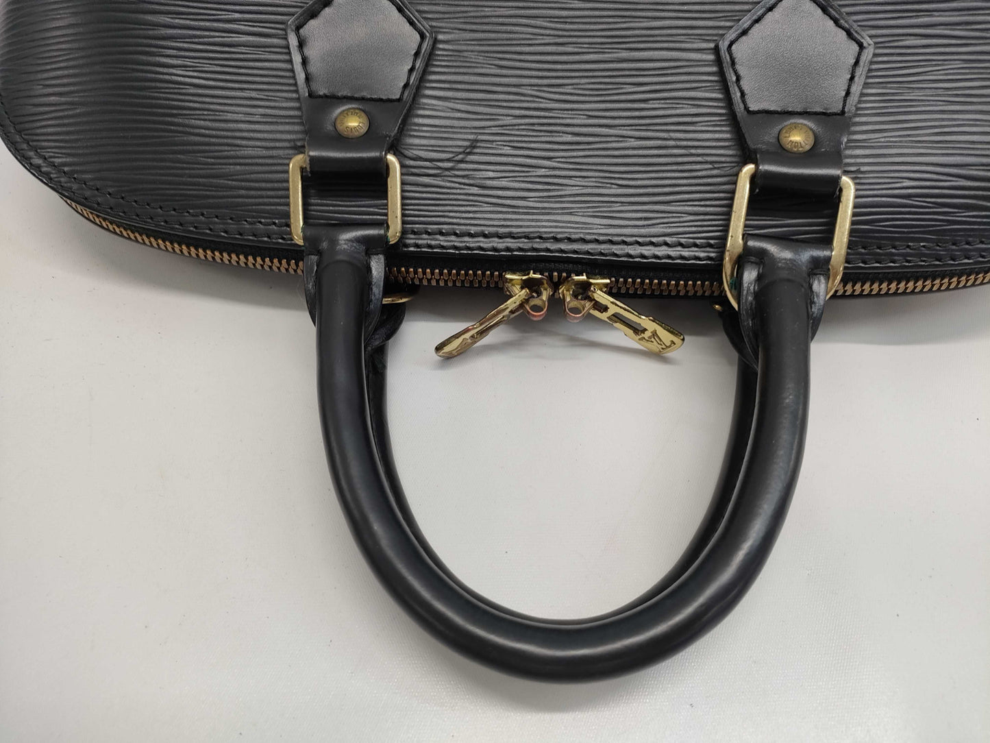 LOUIS VUITTON Epi Alma PM Noir Handbag