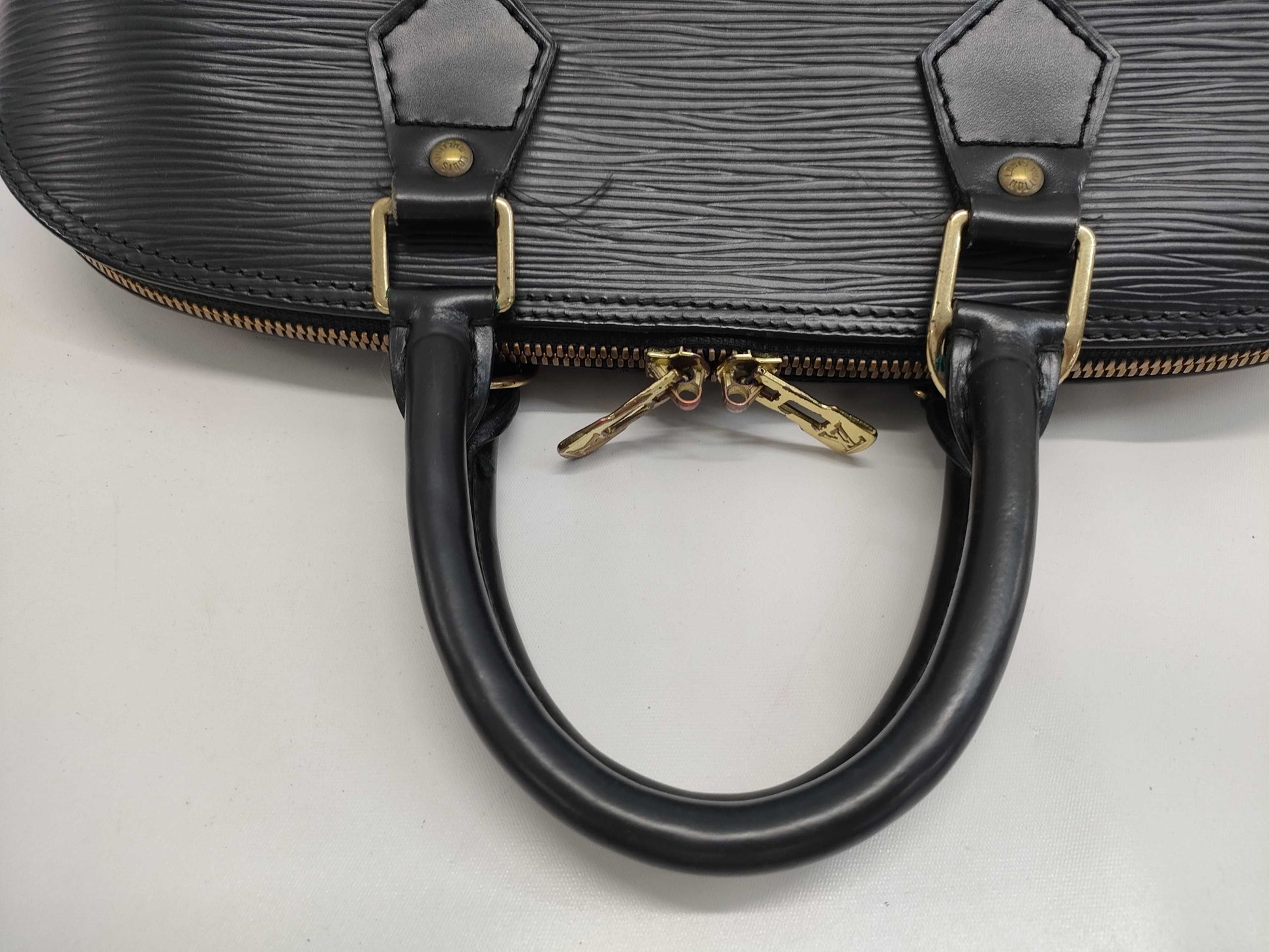 LOUIS VUITTON Epi Alma PM Noir Handbag
