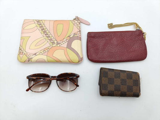 4 items including Armani, Louis Vuitton, Cartier, and Pucci sunglasses.