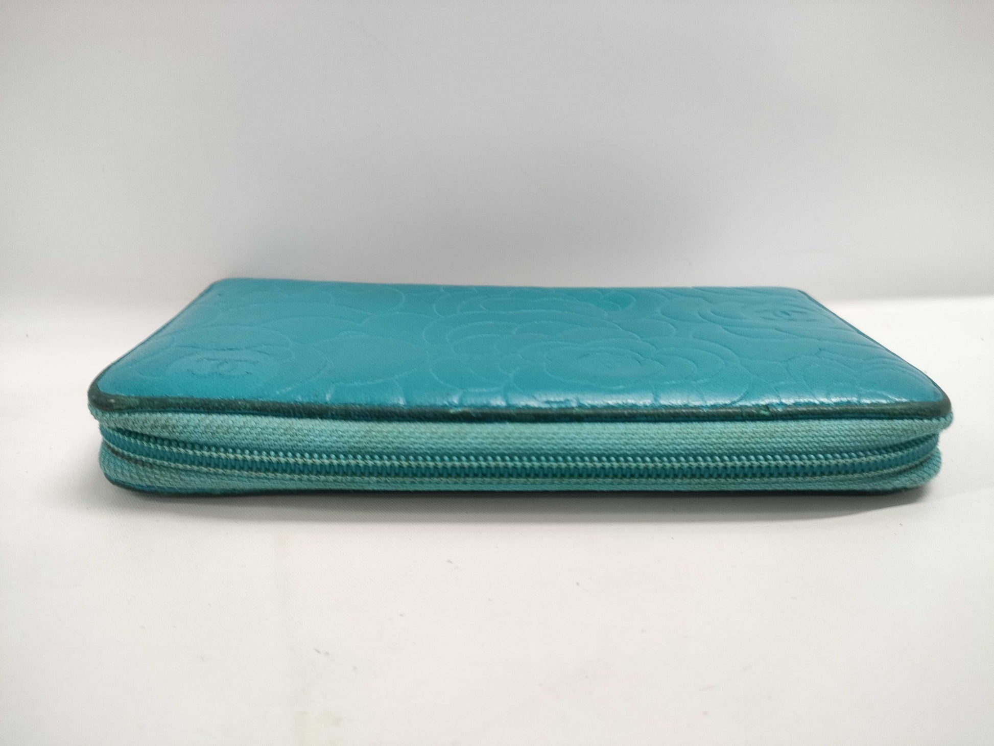 CHANEL Lambskin Camellia Round Wallet