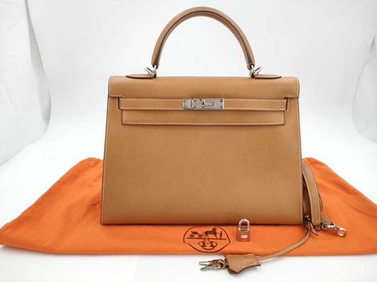 HERMES Kelly 32 Epsom Gold Silver Hardware H Stamped Handbag