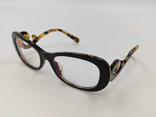 PRADA Sunglasses and Glasses