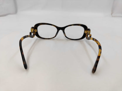 PRADA Sunglasses and Glasses