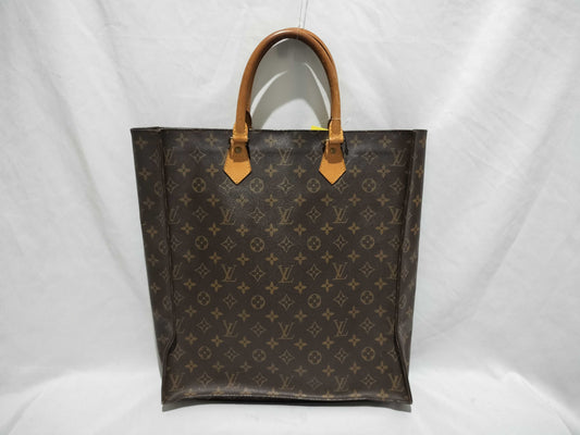 LOUIS VUITTON Monogram Sack Plastic Handbag