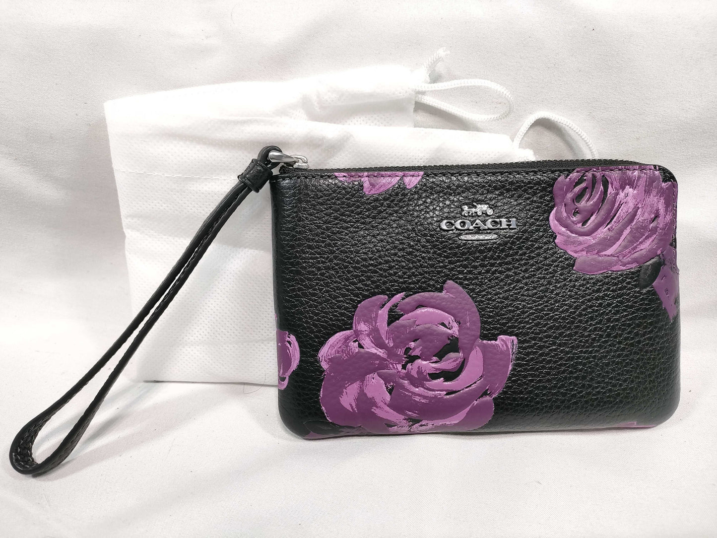 COACH floral pouch