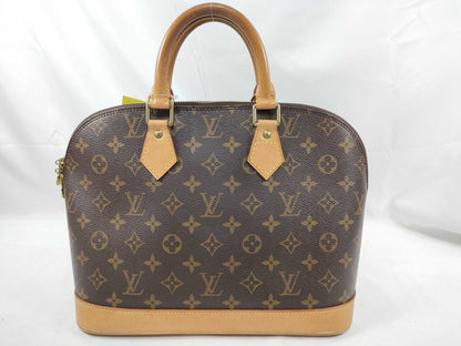 LOUIS VUITTON Monogram ALMA Handbag