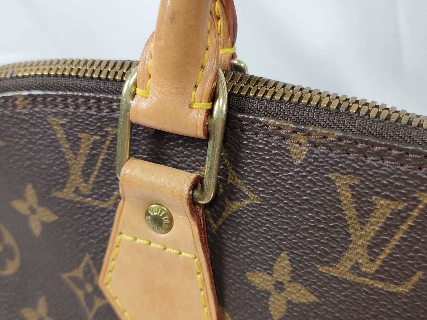 LOUIS VUITTON Monogram ALMA Handbag