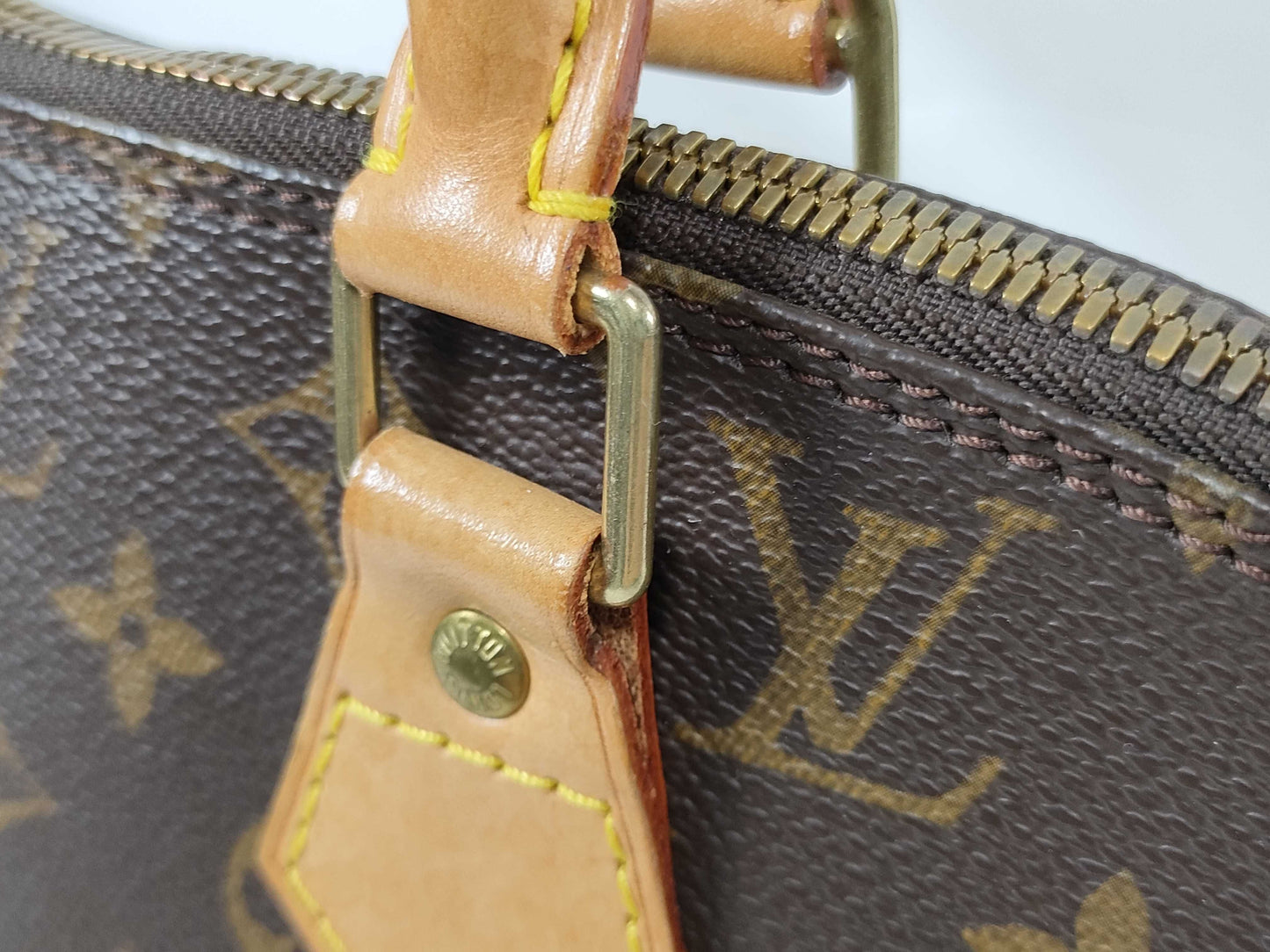 LOUIS VUITTON Monogram ALMA Handbag