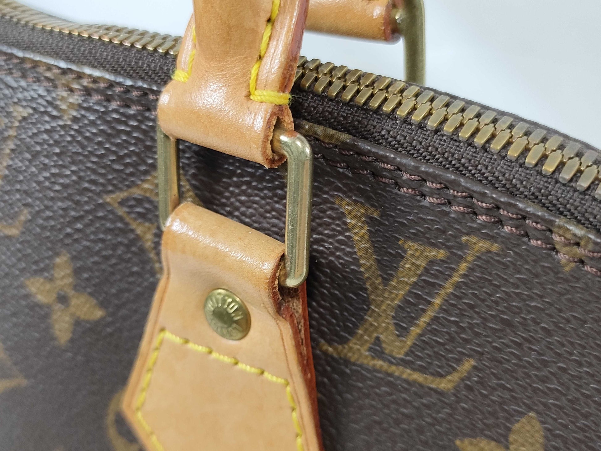 LOUIS VUITTON Monogram ALMA Handbag