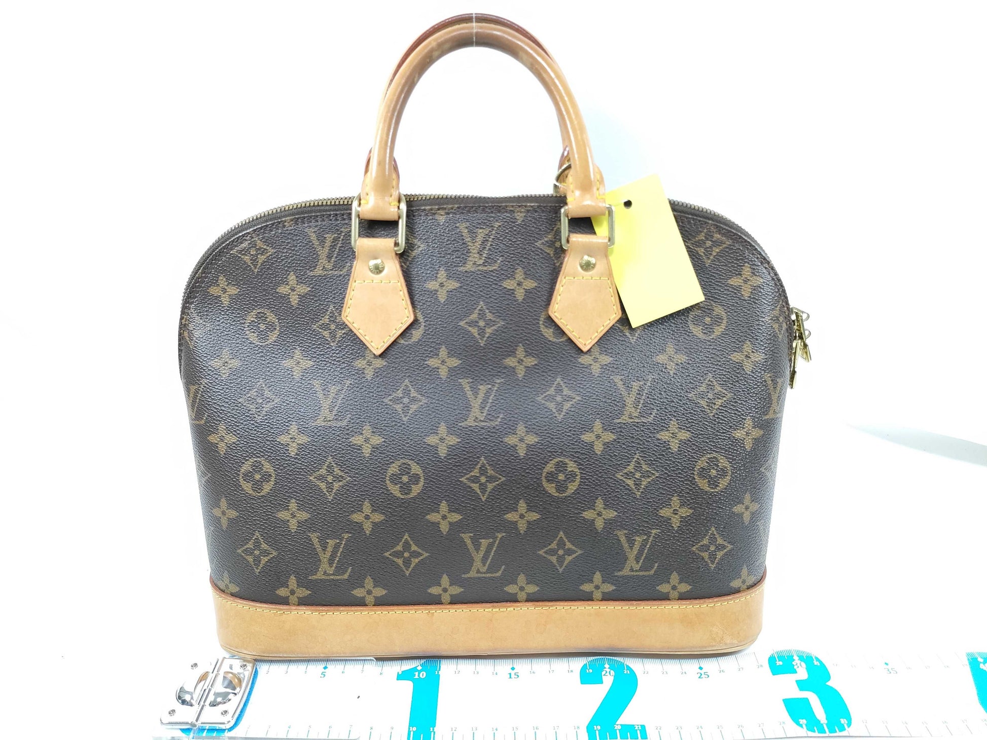LOUIS VUITTON Monogram ALMA Handbag