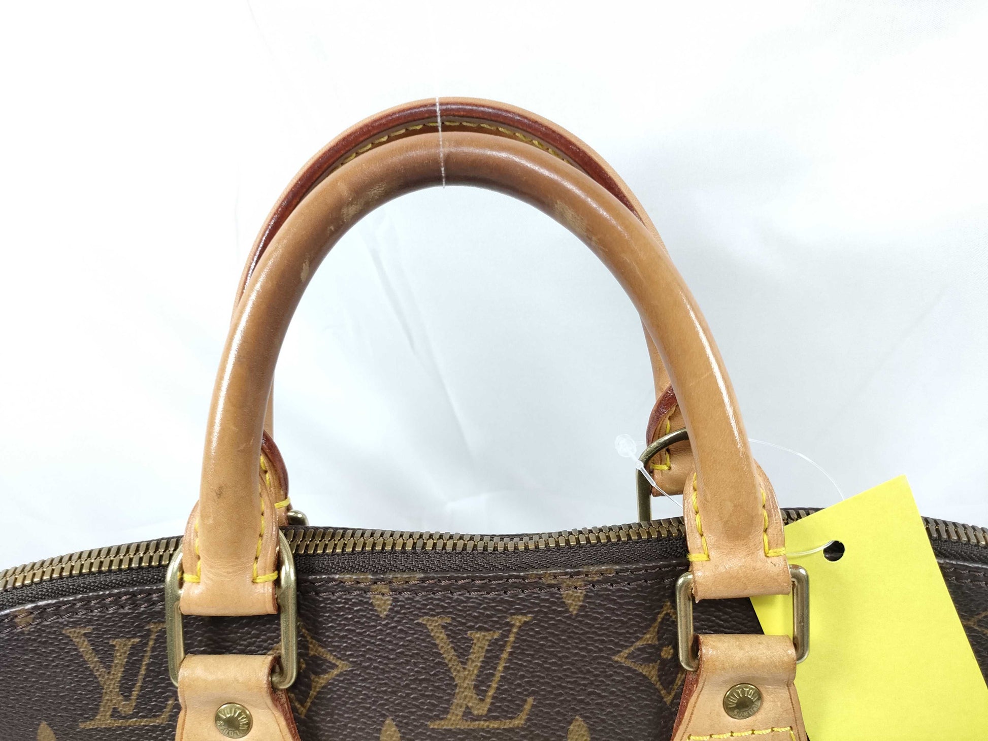 LOUIS VUITTON Monogram ALMA Handbag
