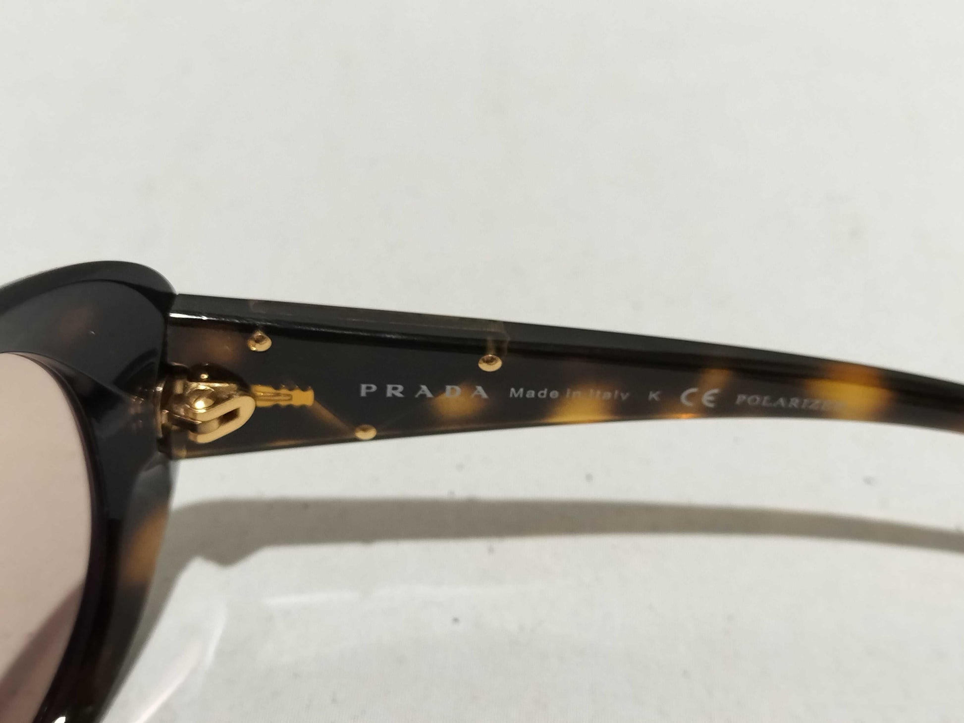 PRADA Triangle Plate SPR27L 2AU-5Y1 Sunglasses/Eyeglasses
