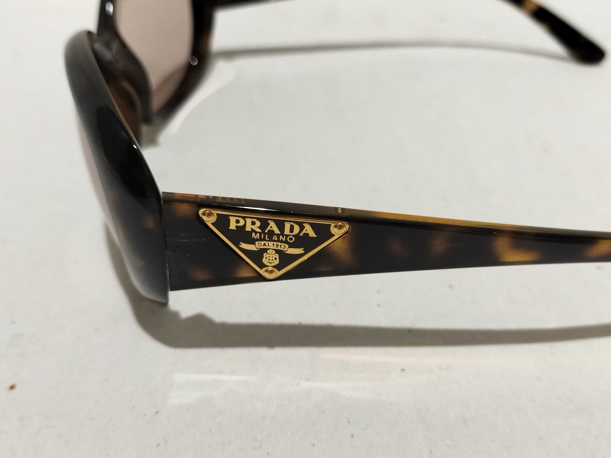 PRADA Triangle Plate SPR27L 2AU-5Y1 Sunglasses/Eyeglasses