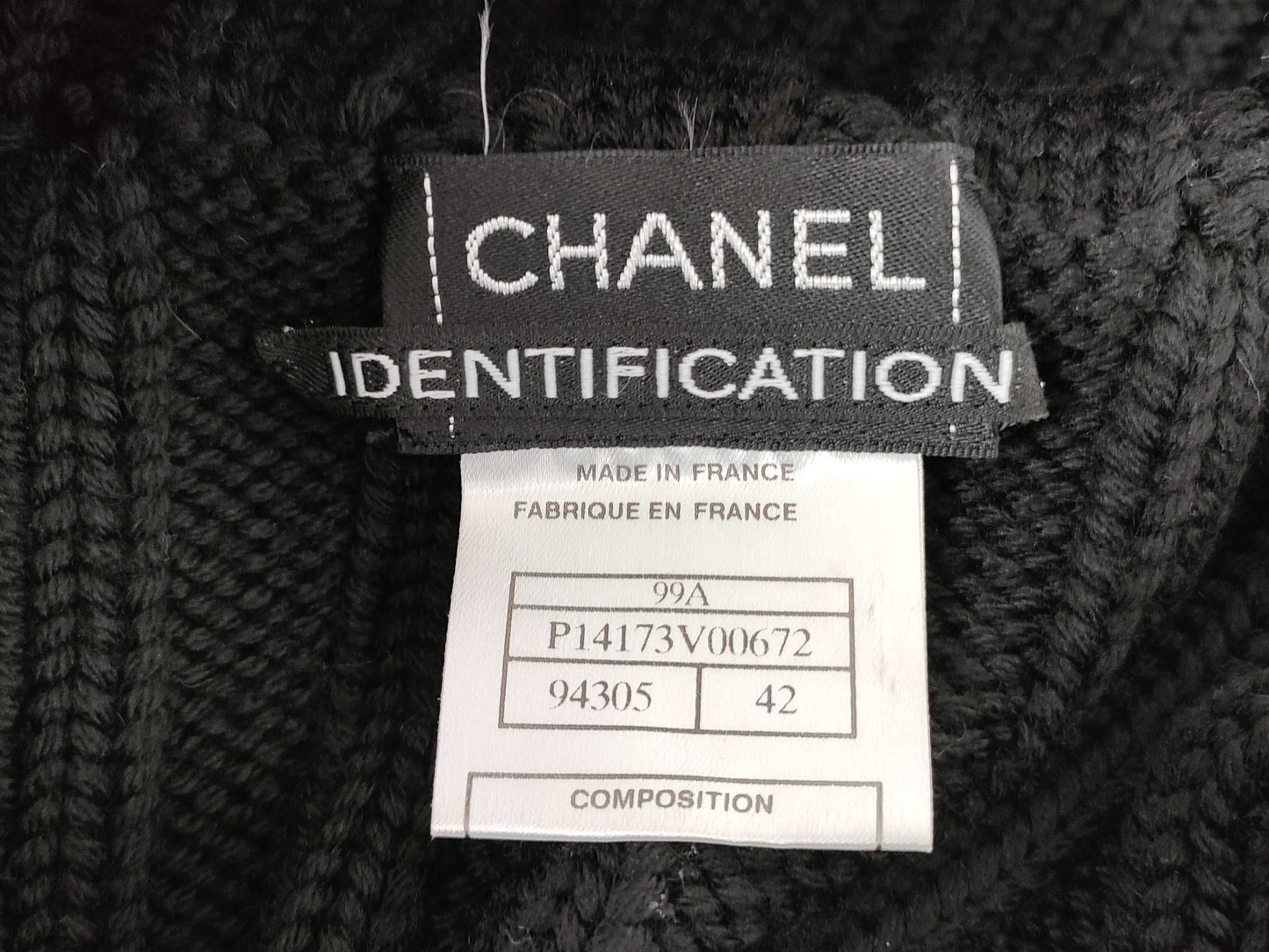 CHANEL 99A logo plate off-white turtleneck knit top in black
